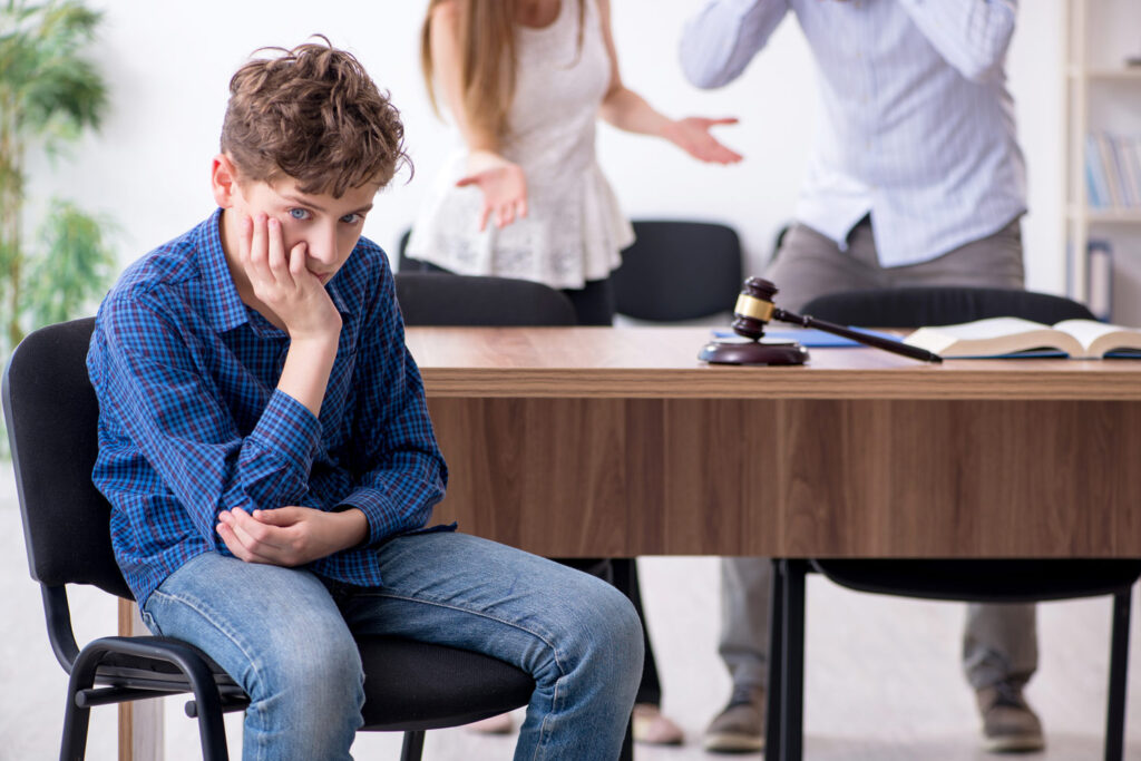 a boy witnessing domestic violence in his home